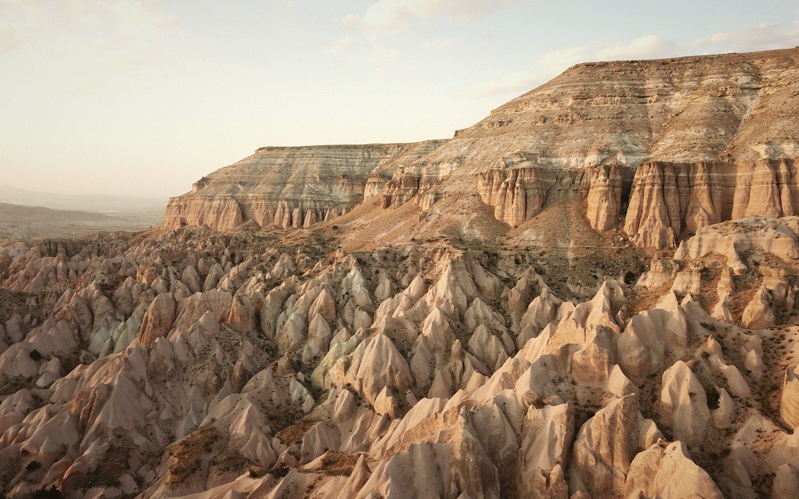 rock-cut valleys in Cappadocia at dawn