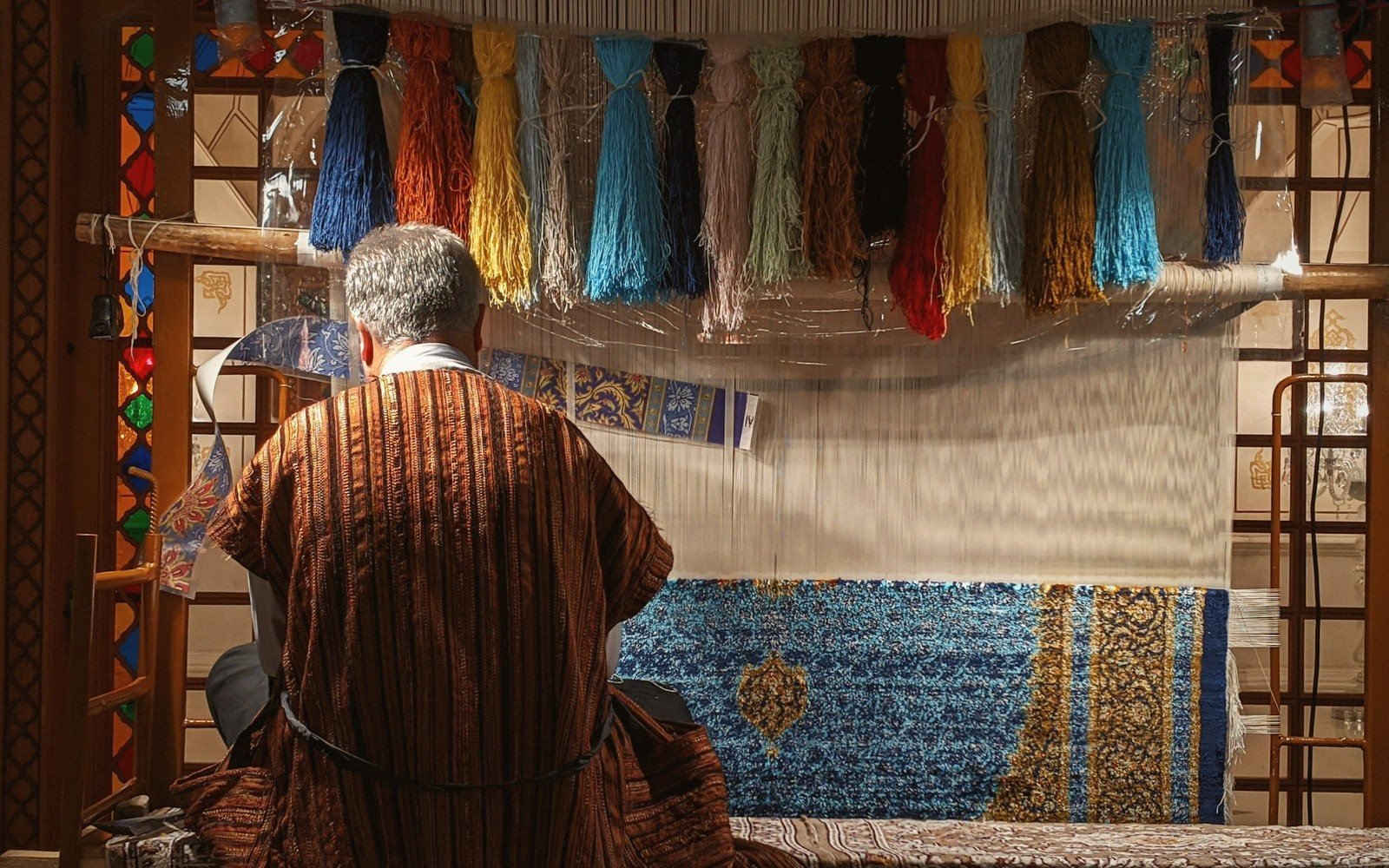 a carpet loom with a partly finished rug